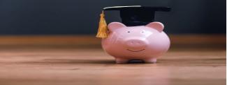 Piggy bank with graduation mortar