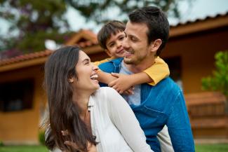 Couple with child laughing